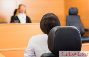 person in courtroom before judge